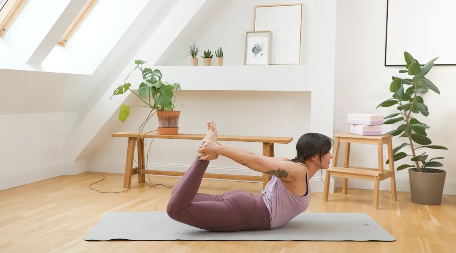 Woman doing yoga to ease PMS