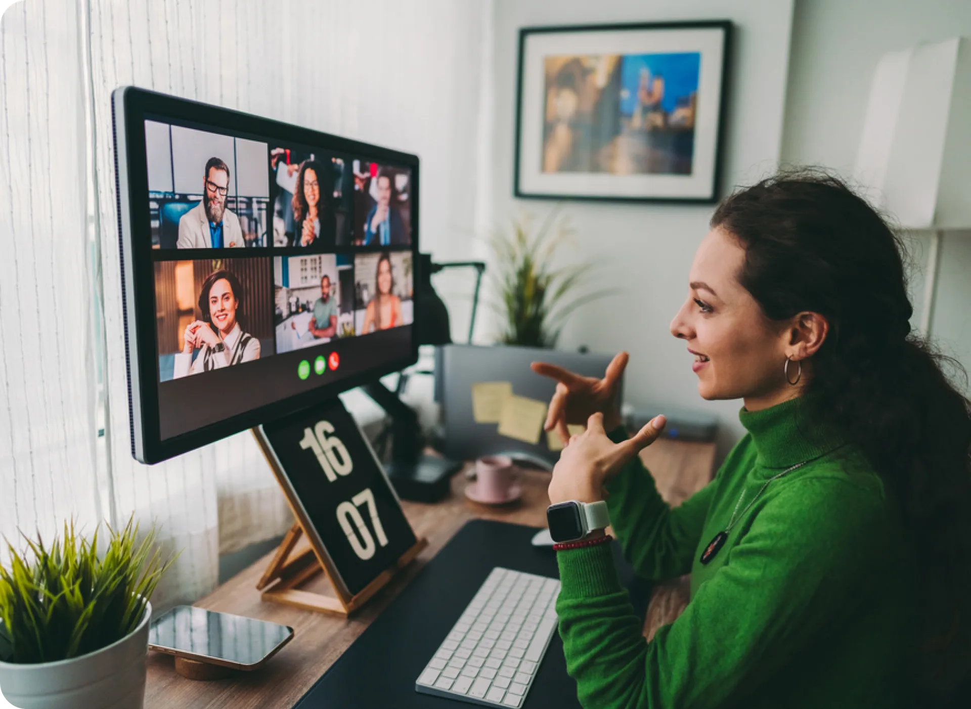 A participant follows a live format at her desk, with several people joined in